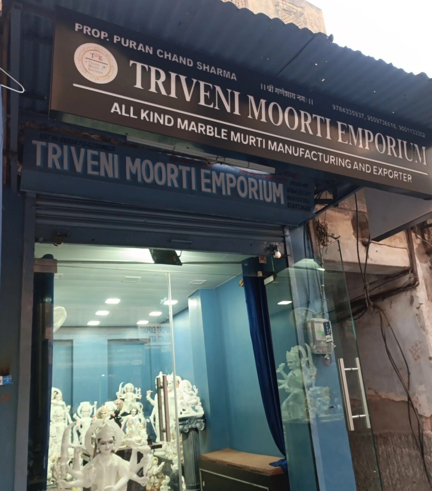 Triveni Moorti Emporium marble statue manufacturer